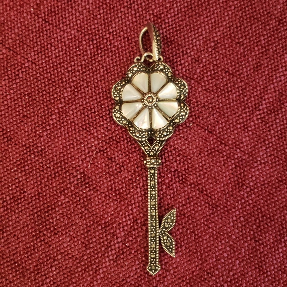 Marcasite and mother of pearl sterling key pendant